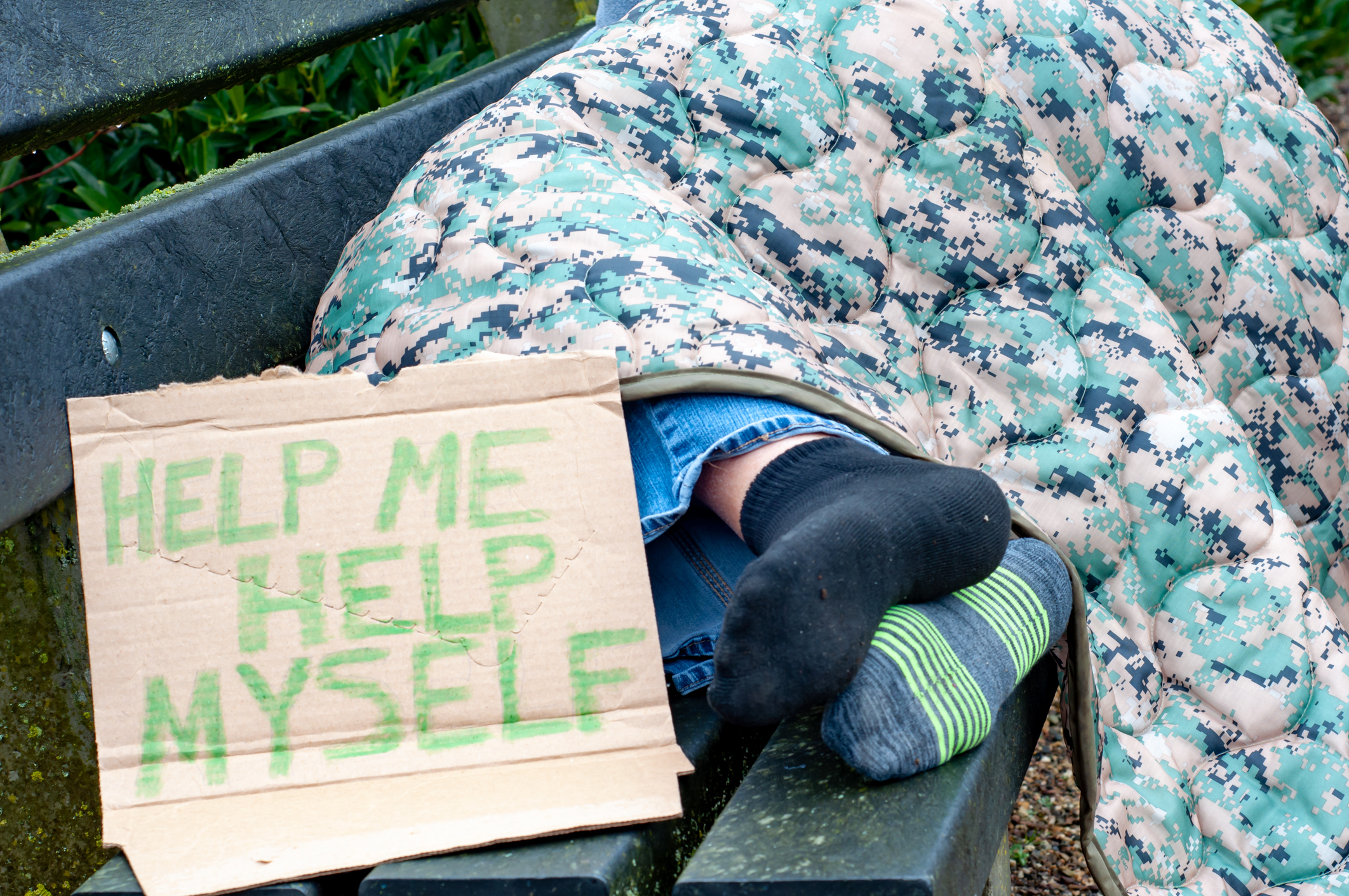 Homeless Person on Park Bench
